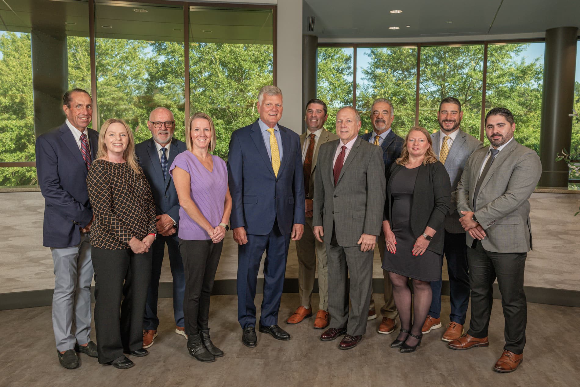 The NAAG team standing together for a group photo in the office.