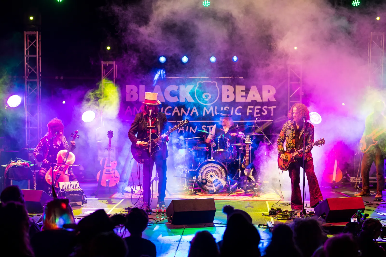 Musicians performing on stage at Black Bear Music Fest