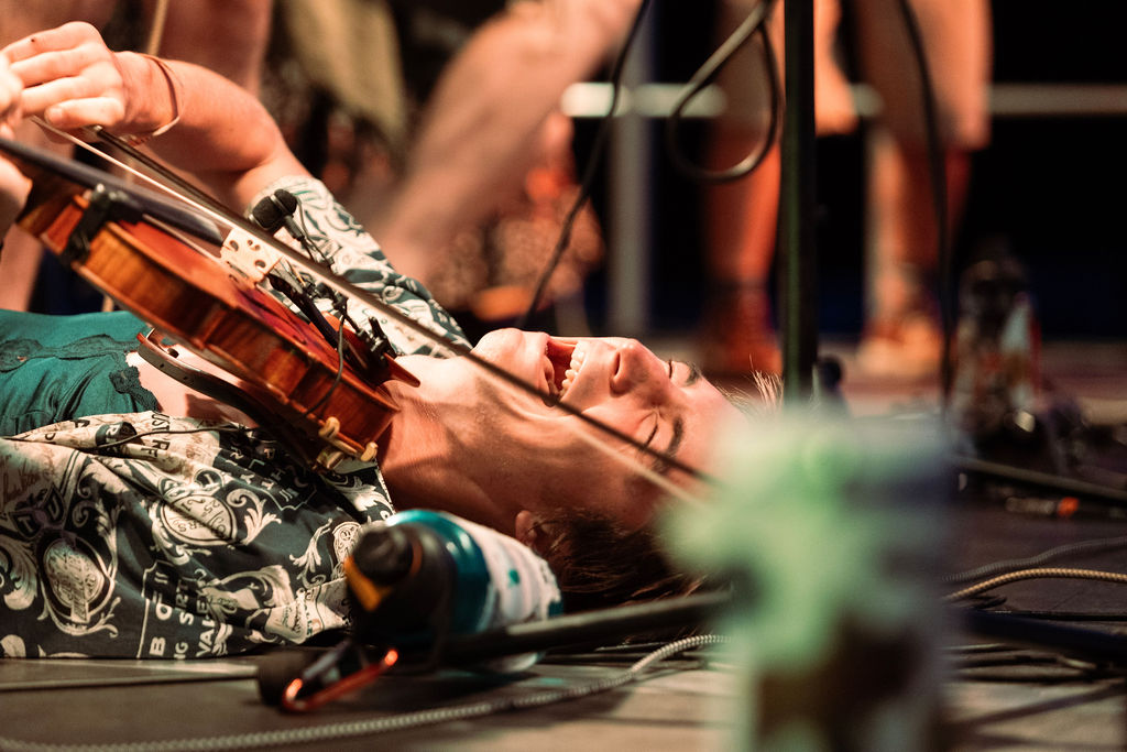 Musicians performing on stage at Black Bear Music Fest