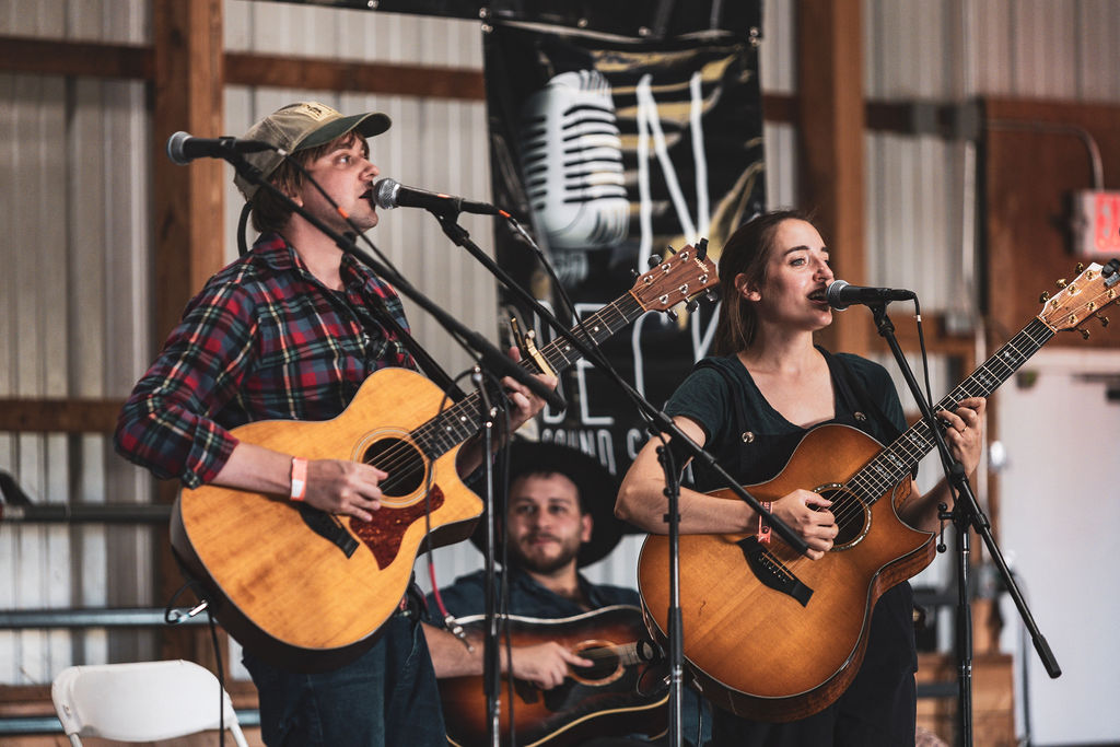 Musicians performing on stage at Black Bear Music Fest