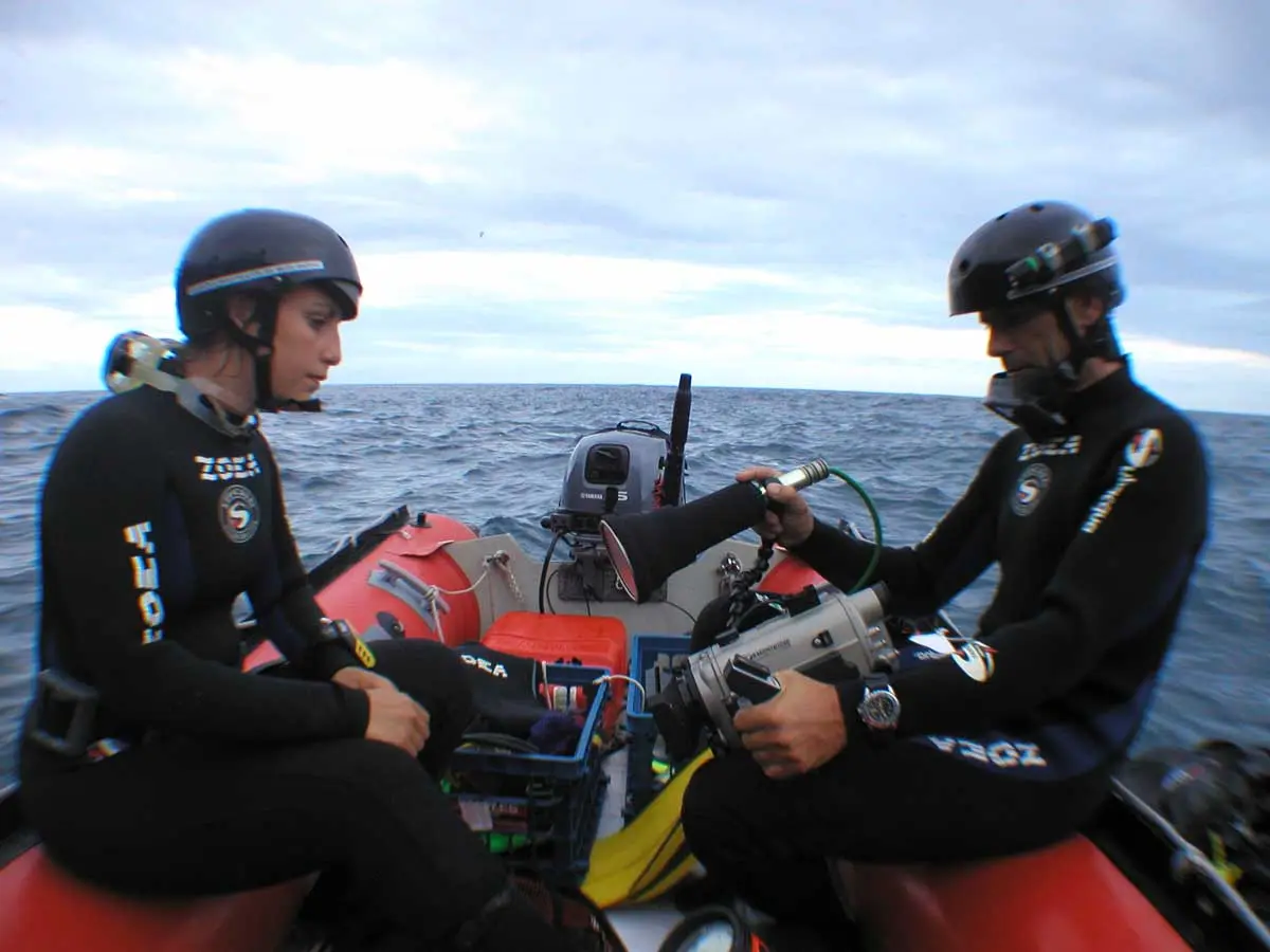 Sole Esnaola and Juan Pablo Camblor  from Zoea about to go scuba diving in Costa Rica during the 2005 Oceana Transoceanic Expedition