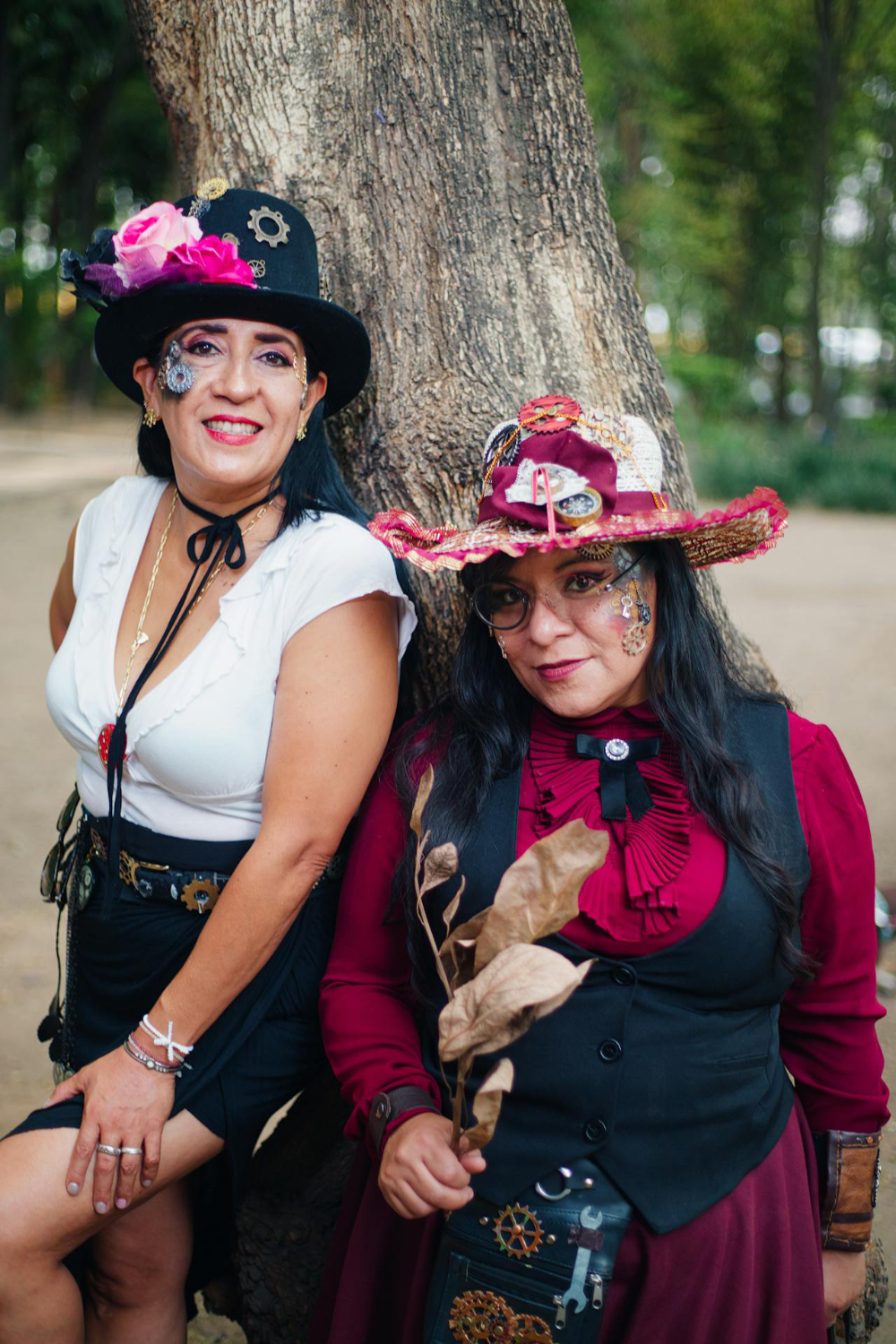 Two ladies dressed in steampunk costumes