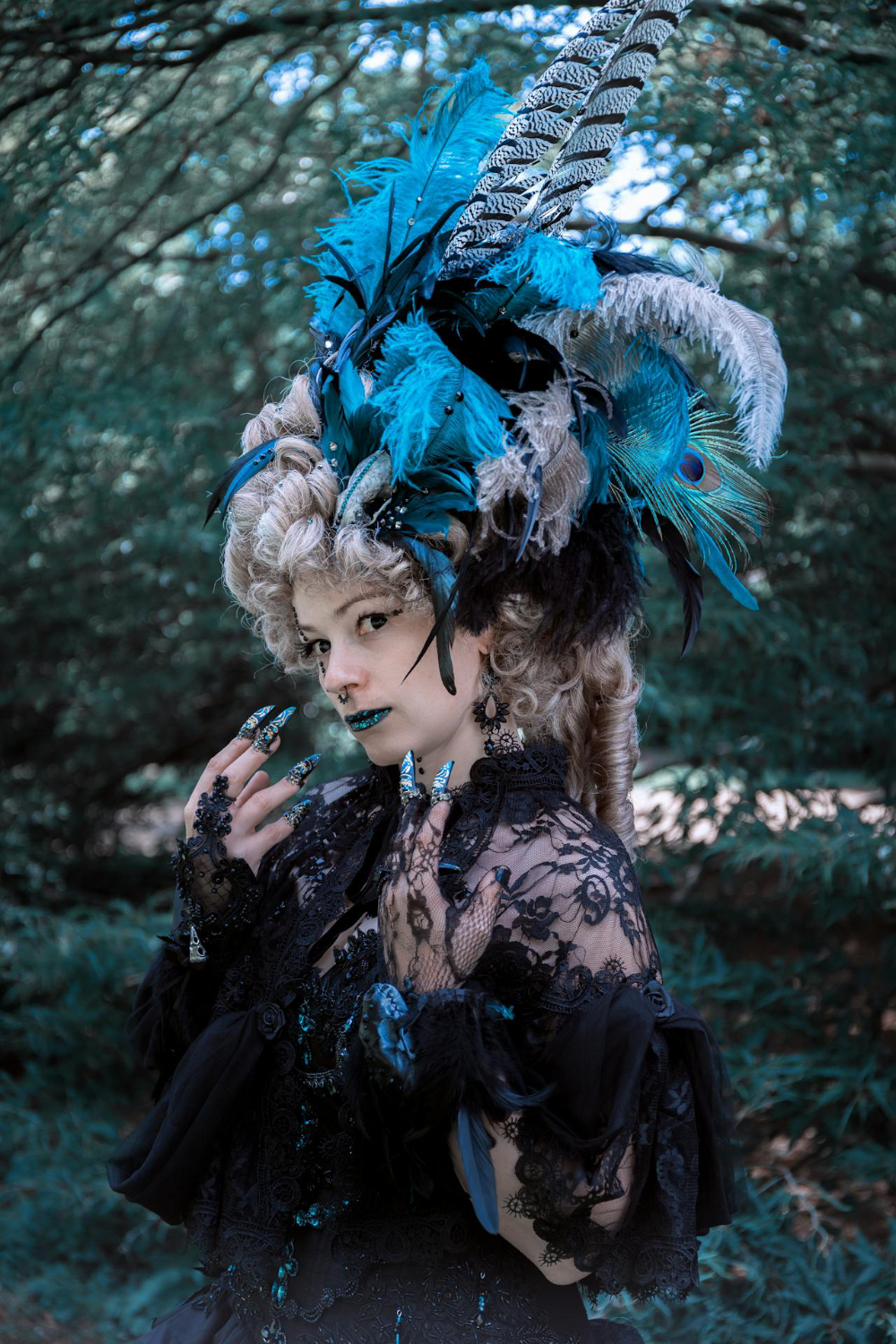 A woman wearing a steampunk costume with a gothic flavour