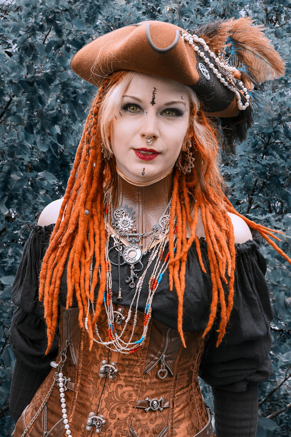 A woman wearing a steampunk pirate costume