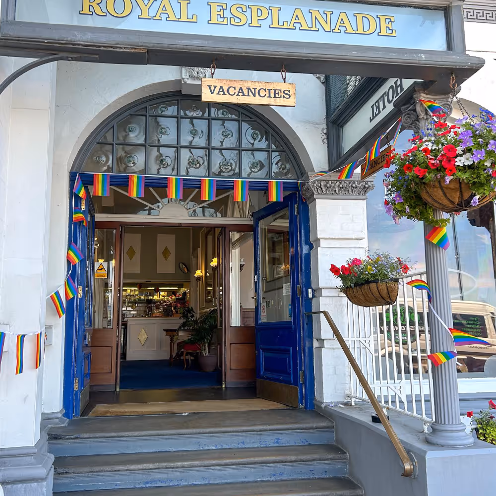 Steps and entrance doors of an elegant period hotel.