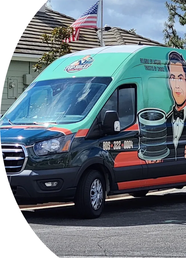Teal and black service van with tire logo and American flag