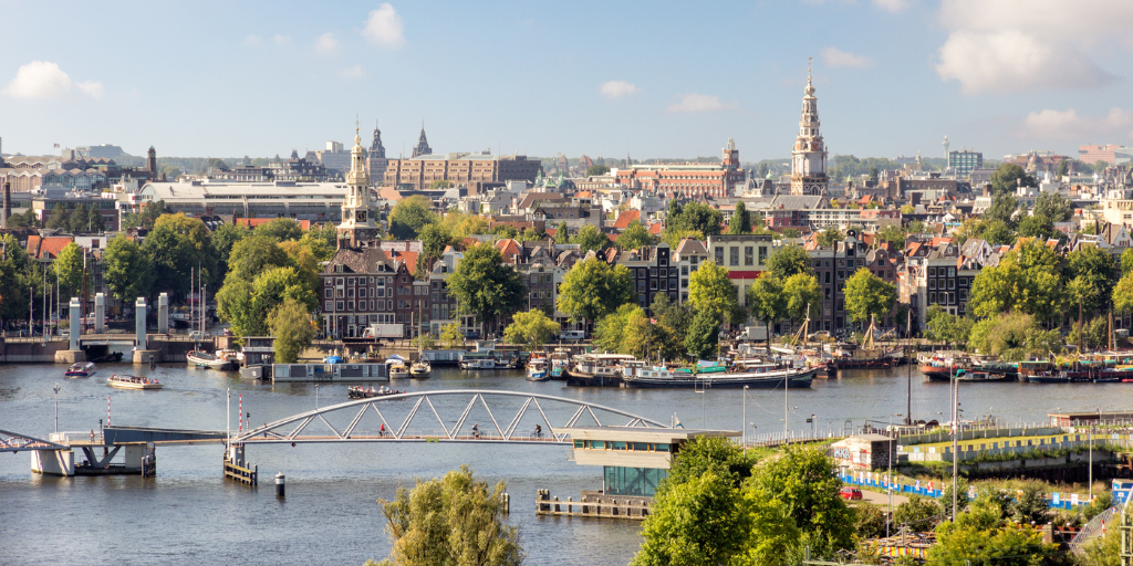 View of Amsterdam city near the Reuters Supply Chain Europe venue, symbolizing the global reach of supply chain networks monitored by Semantic Visions.