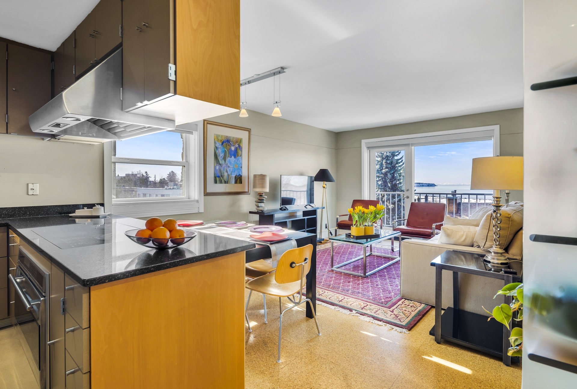 Living room and kitchen in 540 L Street unit 401 with water view