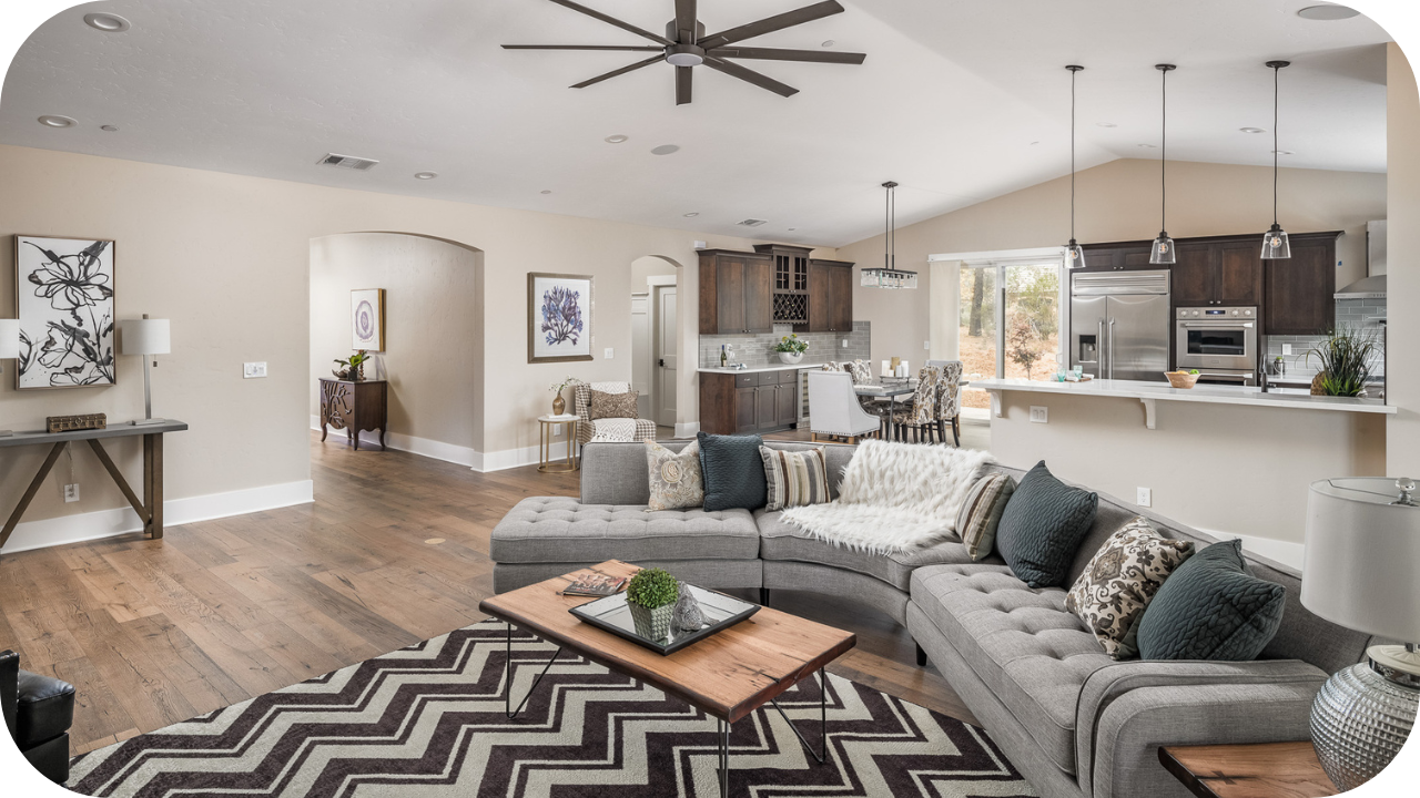 Stylish open-plan living room and kitchen with smart home design, blending modern interior comfort and connected living.
