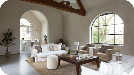 Elegant custom home interior with arched windows, neutral palette, and timeless luxury design