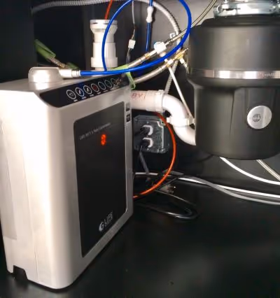 Medical oxygen concentrator with blue and white cables connected