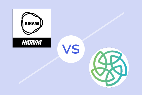 Man pushing a large black wrapped pallet onto the back of a blue delivery truck using a metal ramp.