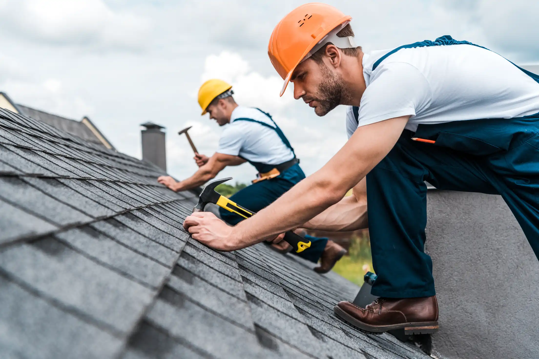 An expert doing a roof inspection in Grand Prairie, TX