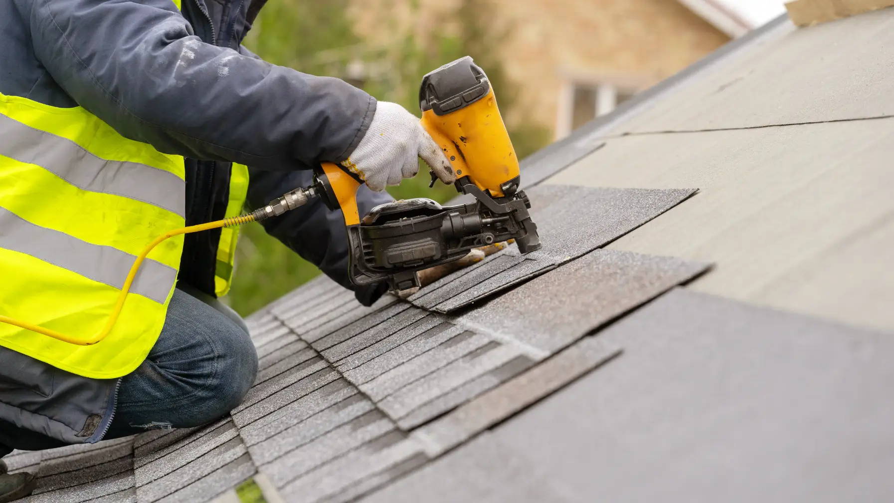 A roofer doing roof maintenance in Irving, TX