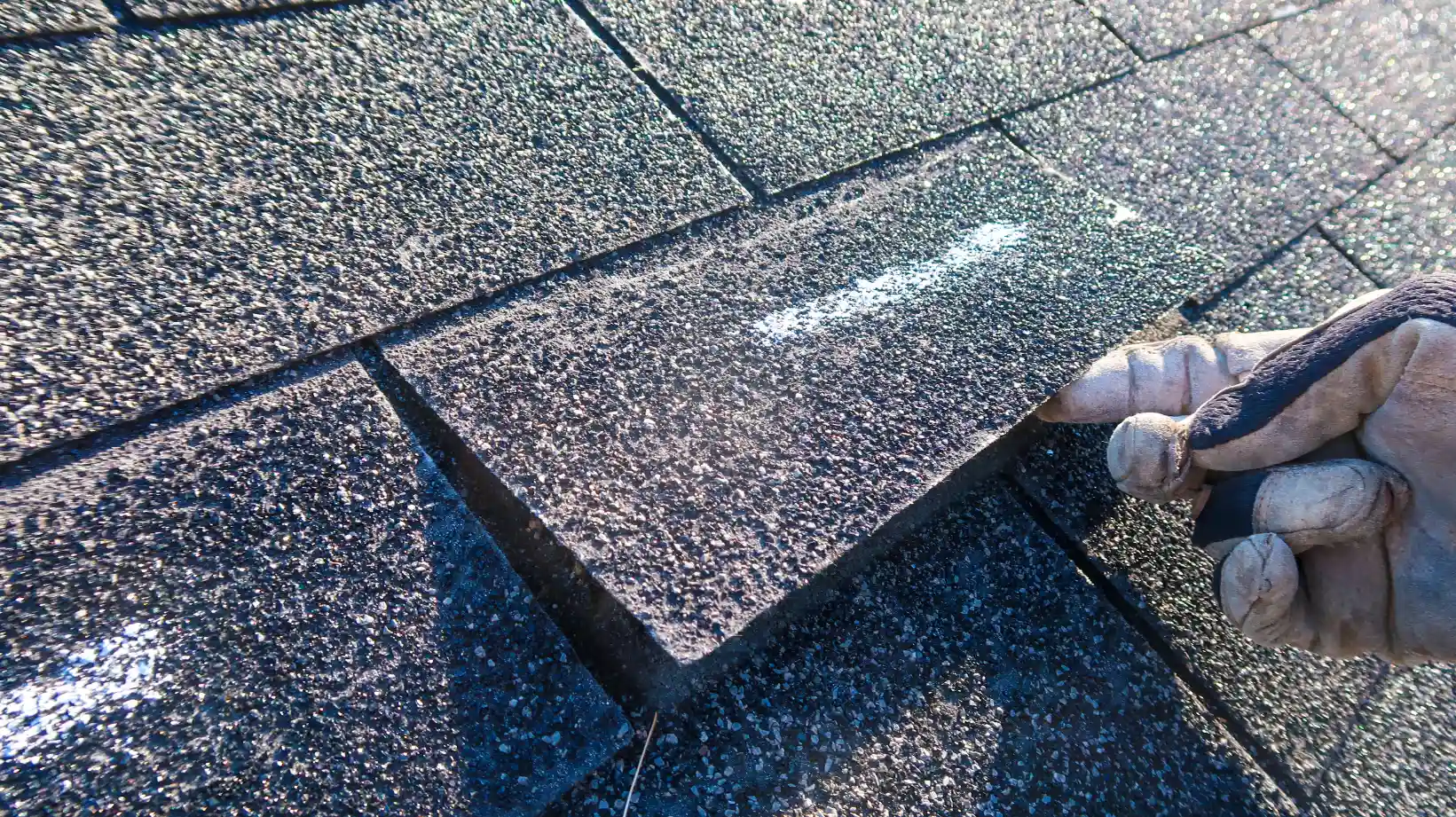 An expert doing a roof inspection in Grand Prairie, TX