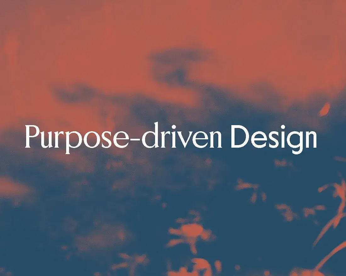 Text "Purpose-driven Design" is displayed in white against a blurred, abstract background with warm orange and deep blue tones, conveying creativity.