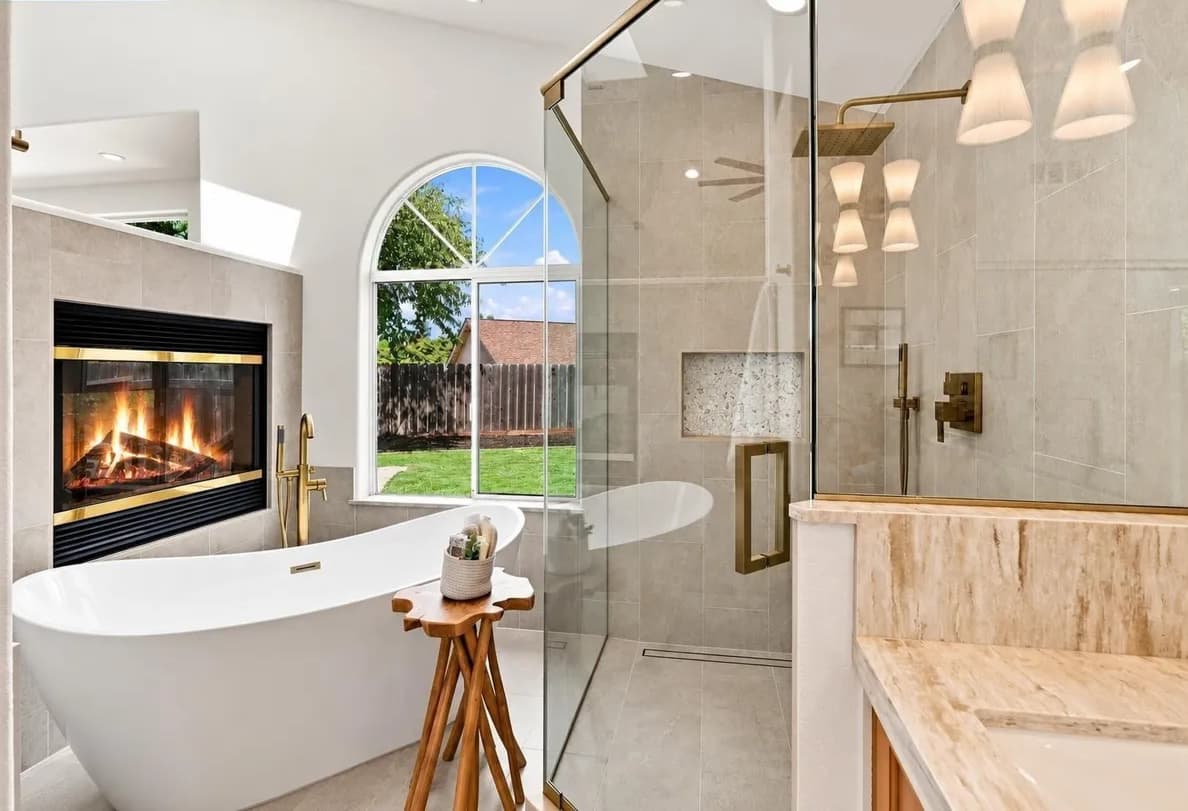 Modern kitchen with vaulted ceiling, wood beams, open shelving, and round dining table