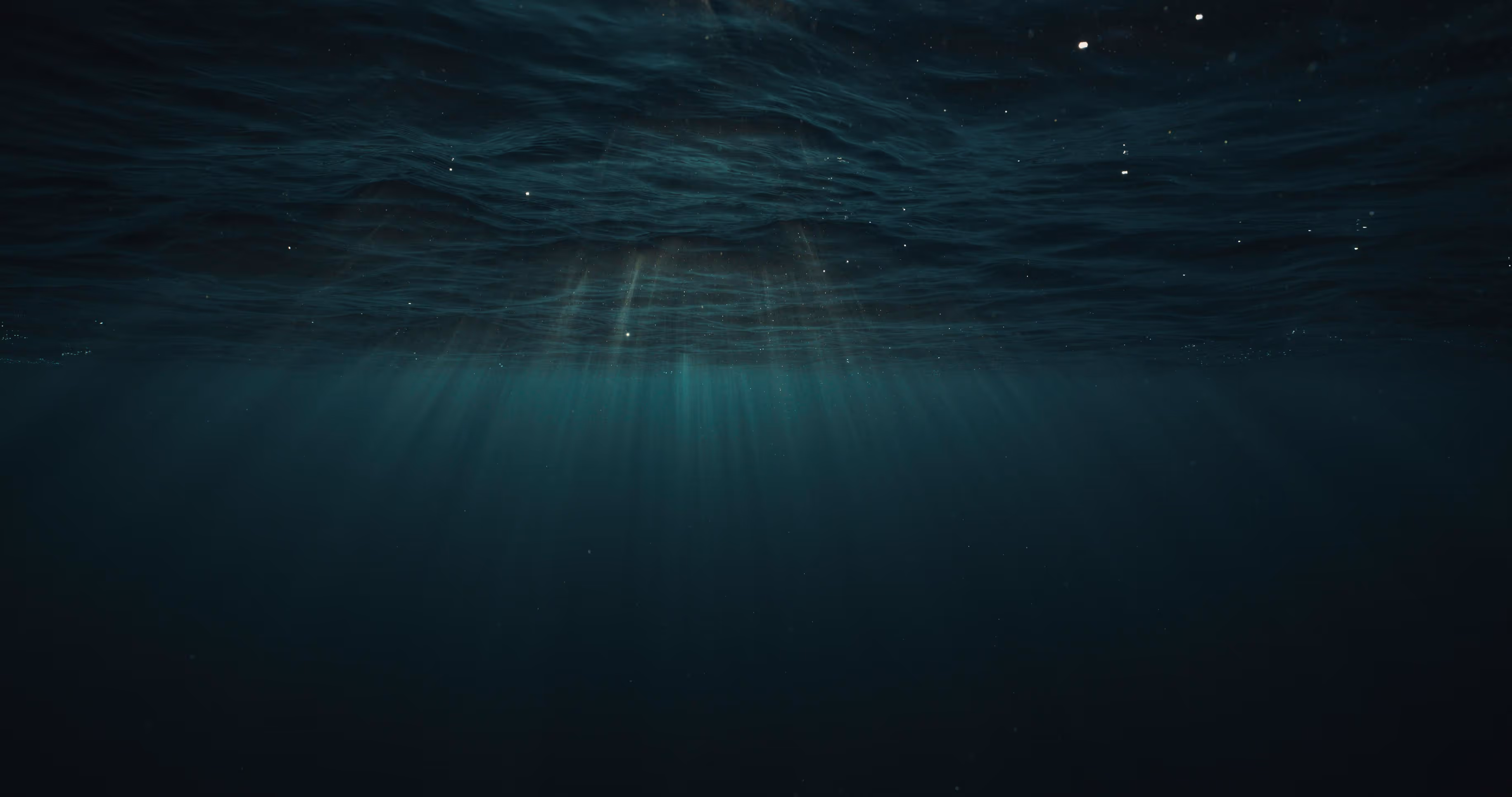 Light breaking through the water surface