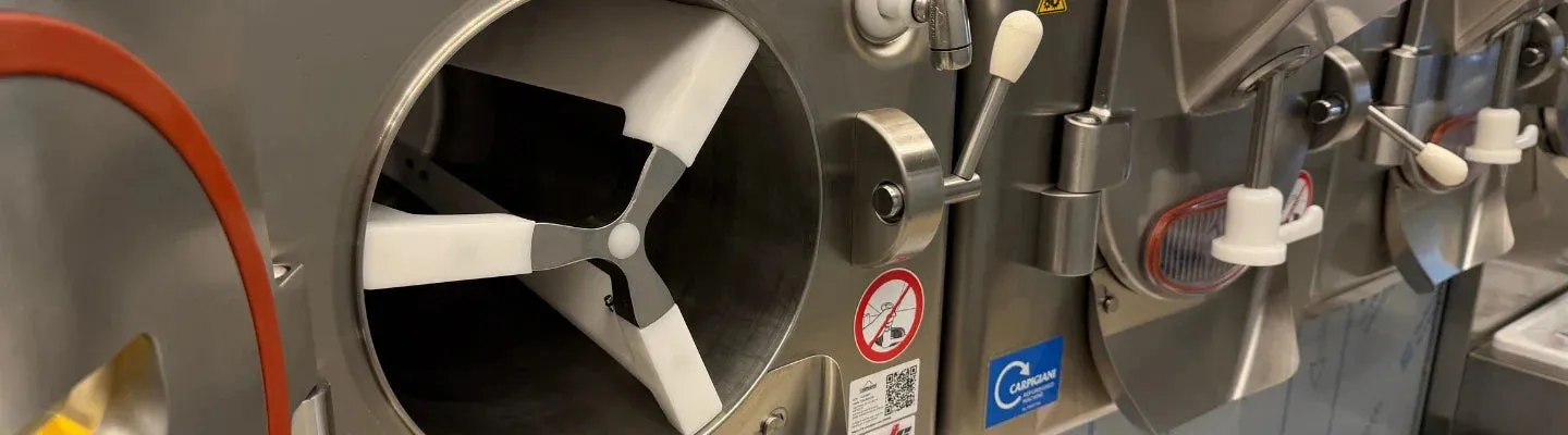 Open freezing cylinders and beaters on Carpigiani ice cream machines