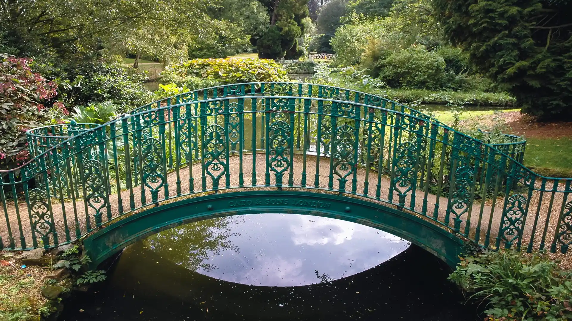 Bridge in Swiss Garden in Old Warden Park located in Biggleswade on the River Ivel in Bedfordshire, UK