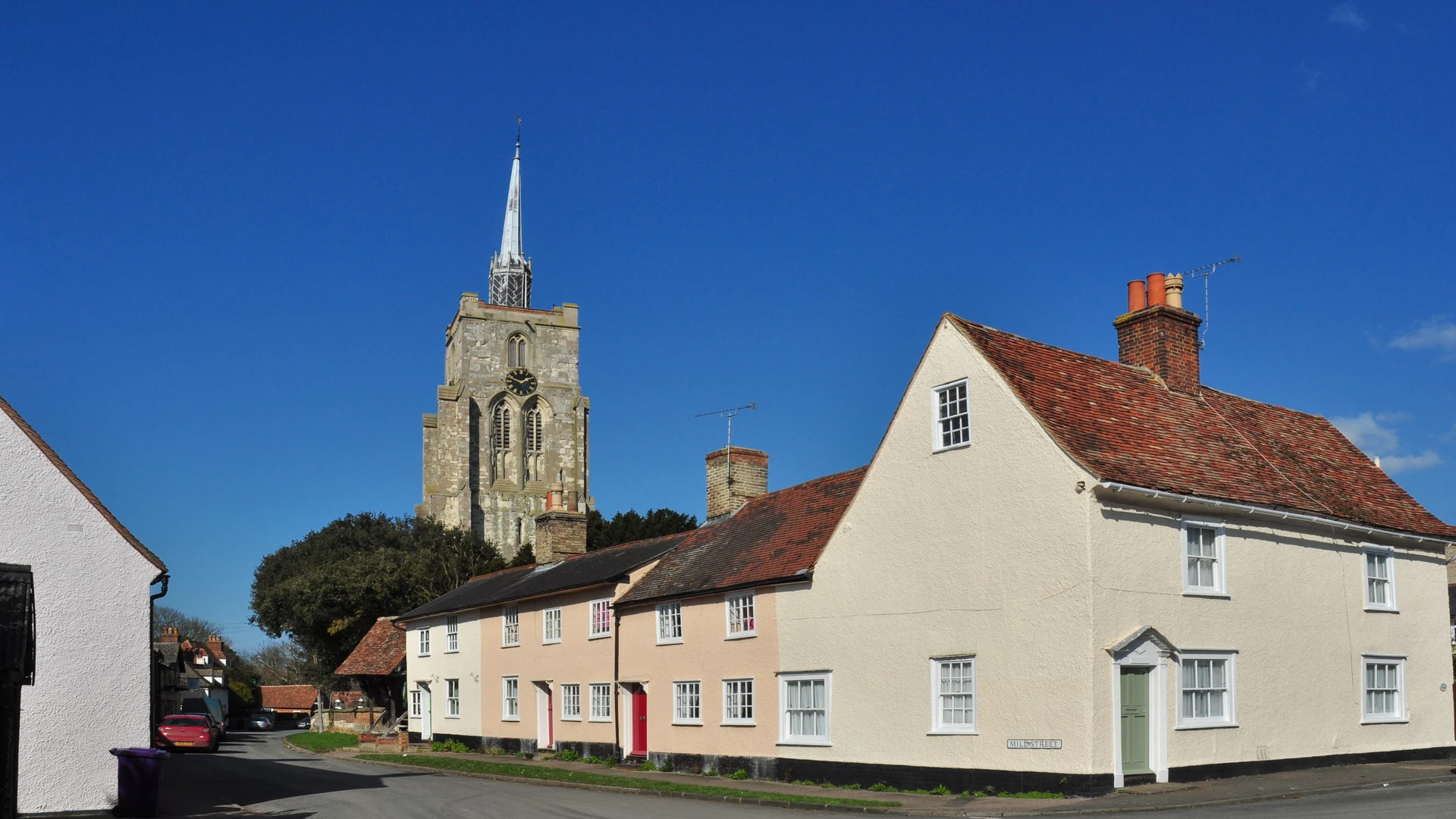A street view of St Mary's Church and Houses, Ashwell, Herts.
