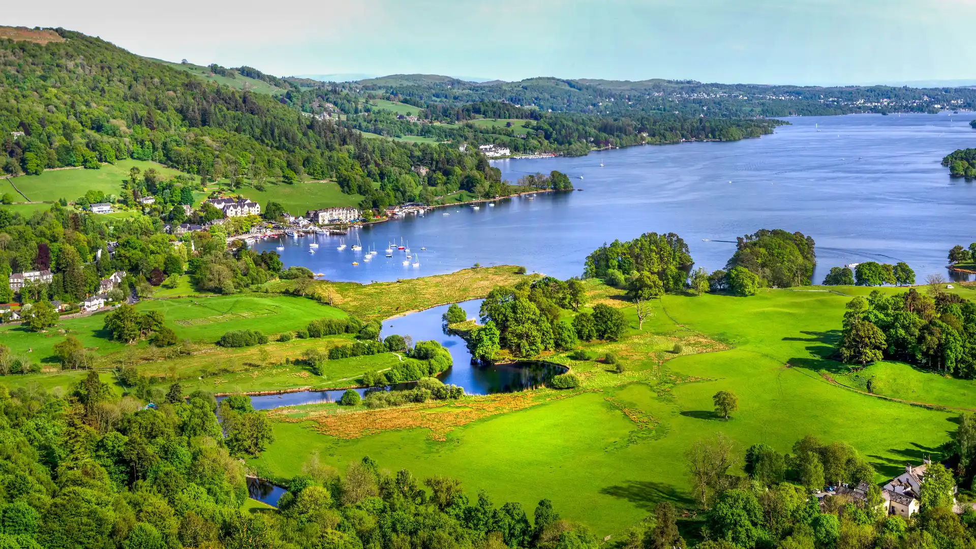 The vast expanse of Lake Windermere shown from above the village of Ambleside in the British Lake District.
