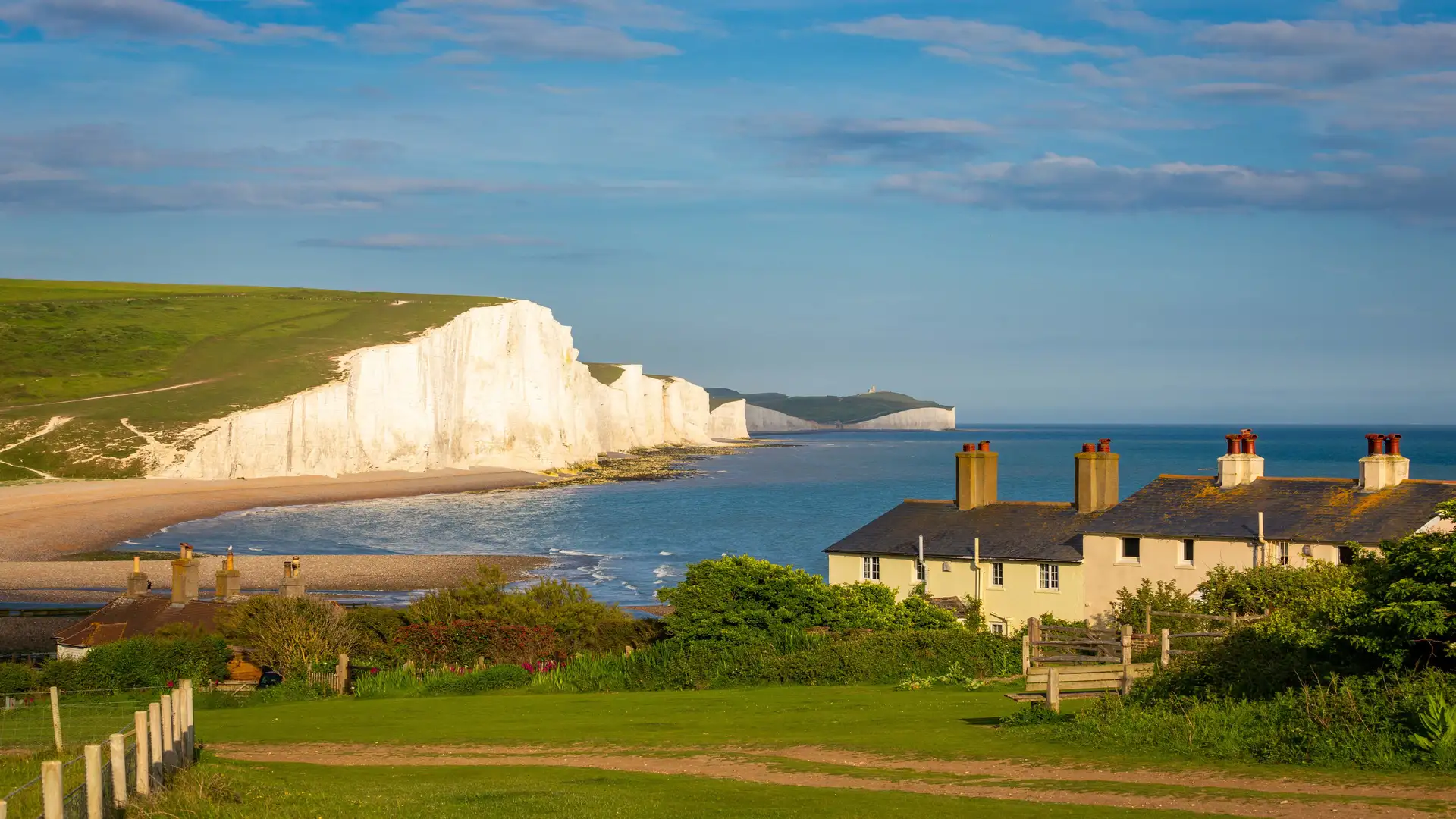 The famous ‘Seven Sisters’ chalk cliffs in the South Downs, East Sussex, UK, on a beautiful afternoon