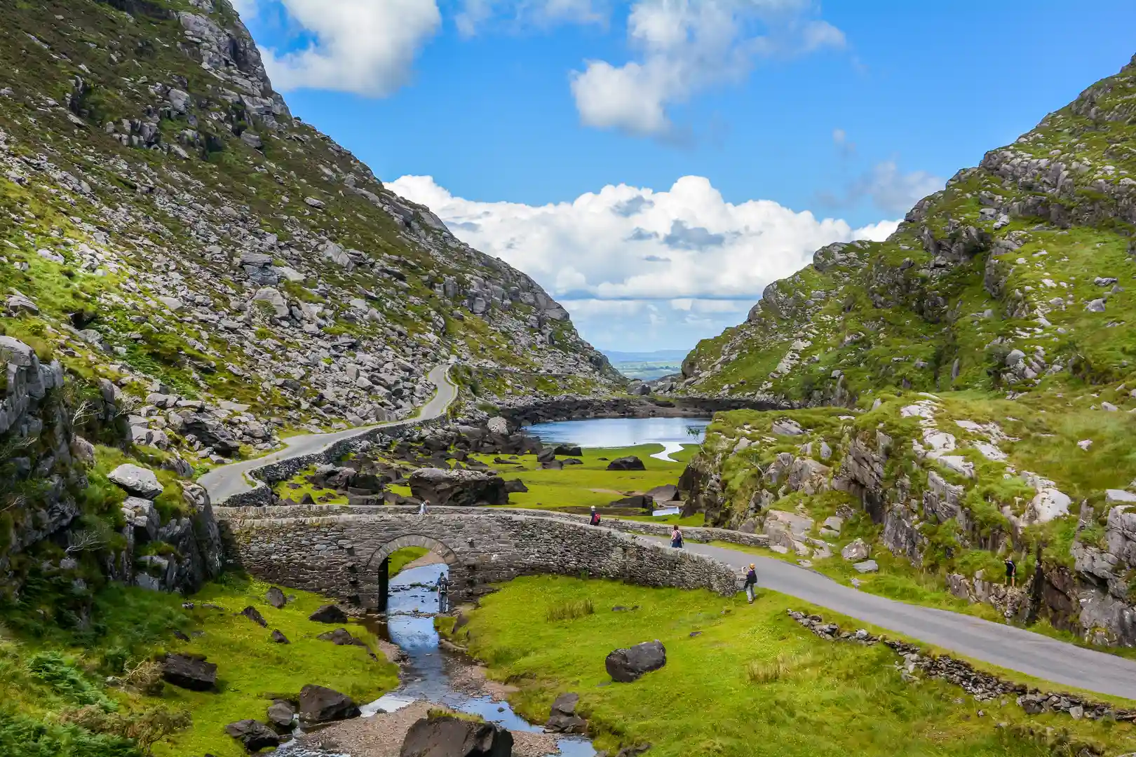 Walkers in the Gap of Dunloe on the Kerry Way, County Kerry, Ireland.
