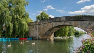Stone bridge over the River Thames along the Thames Path in the Cotswolds.