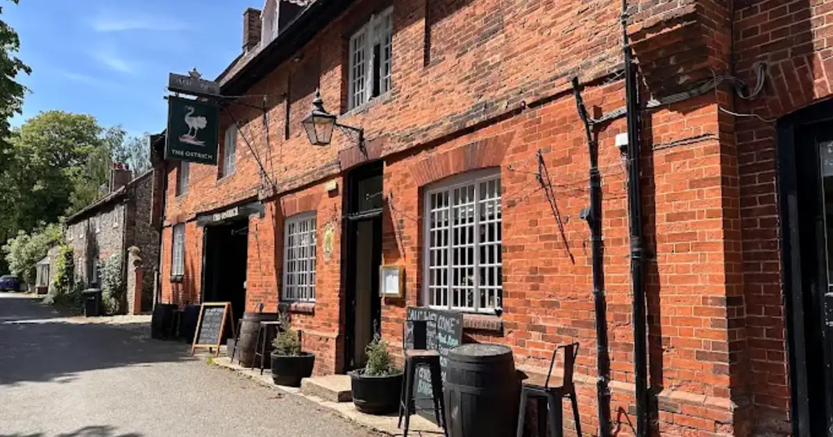 The Ostrich Pub in Castle Acre, a traditional village pub on the Peddars Way in Norfolk.