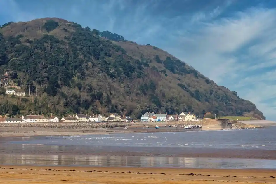 Minehead Harbour and the wooded coast of Exmoor.