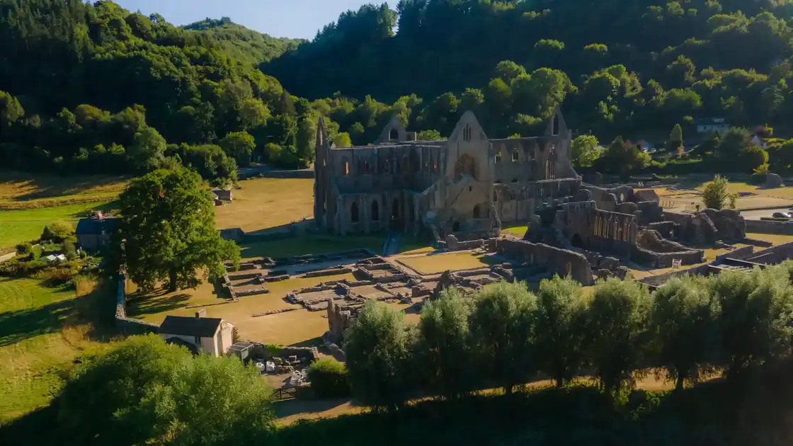 Tintern Abbey in the wooded Wye Valley, Monmouthshire, along the Wye Valley Walk.
