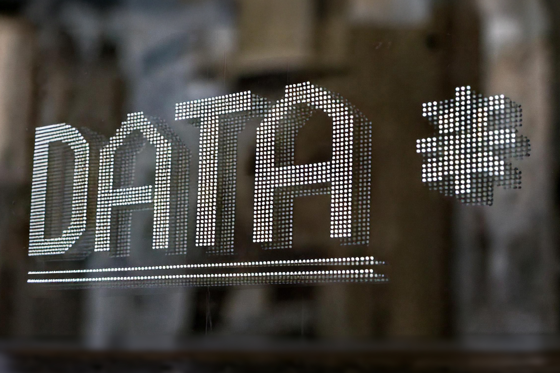 Stylized image of the word 'DATA' with a pixelated star symbol, representing the growing importance of data in digital finance and decision-making.