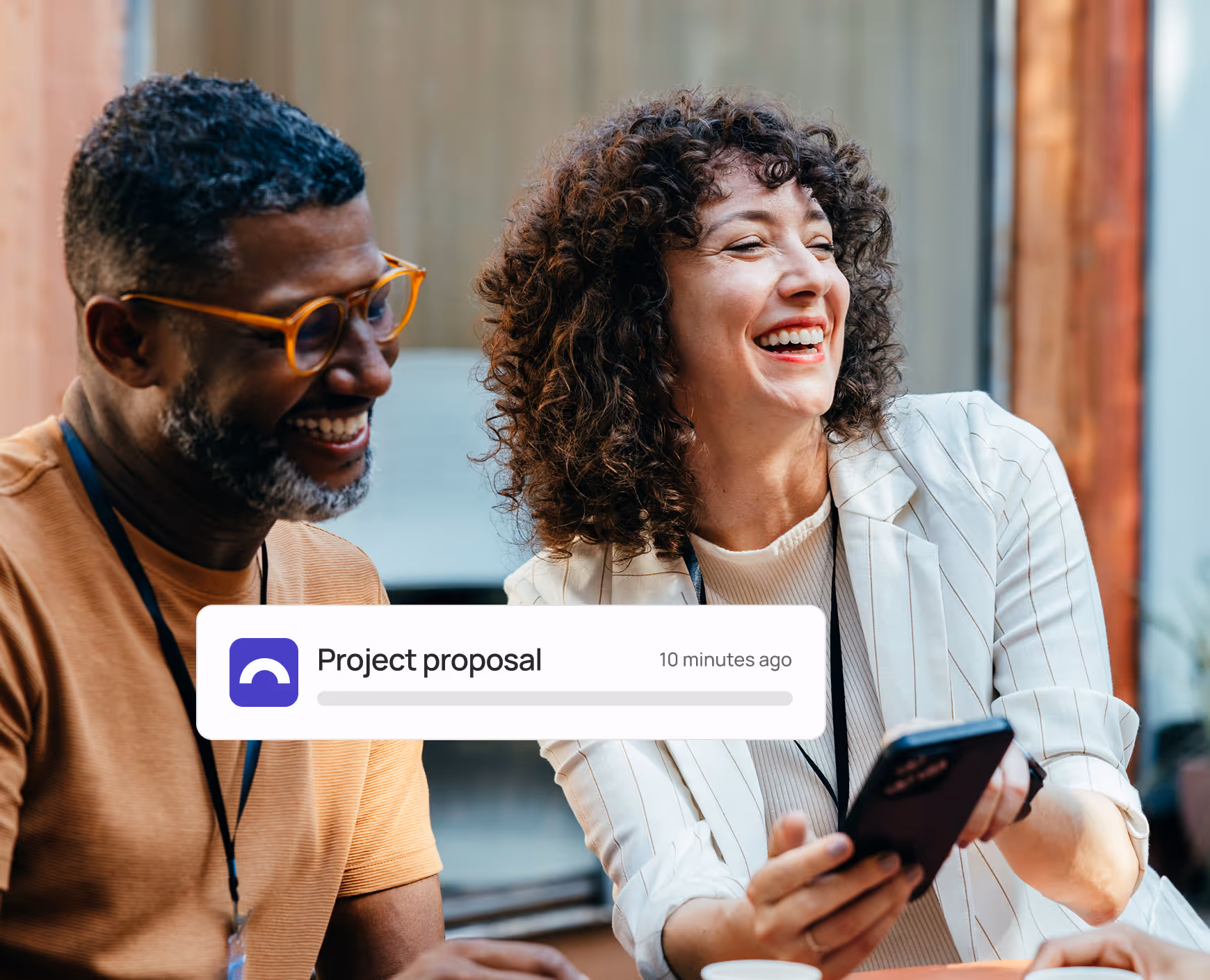 A data architect and a qualitative insight manager from the zoulloo community receiving a notification for a project proposal