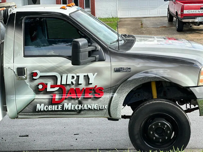 Mobile mechanic service truck with "Dirty Dave's Mobile Mechanic, LLC" branding, equipped for on-site heavy-duty truck diagnostics and repairs.