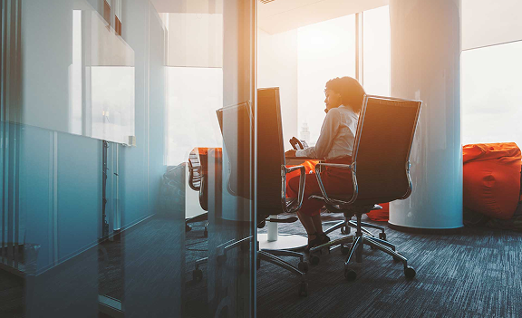 A woman working in an office.