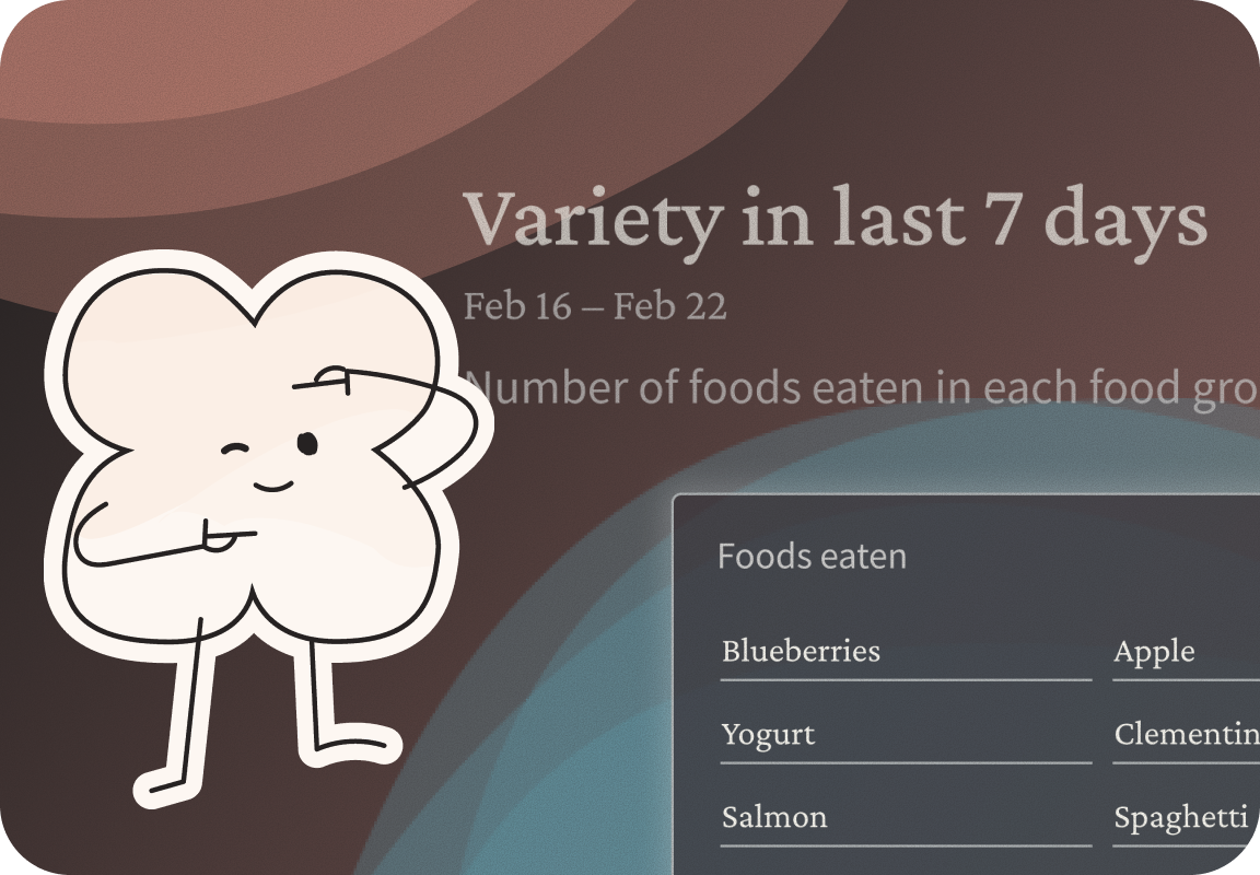 A pale, blush pink character is holding up its hands as a viewfinder to represent perspective. In the background is an overlay from the First Bites app that shows the variety of foods tried over a 7-day interval.