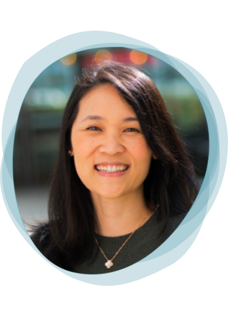 Headshot of Angela Chang, M.D. with a pale blue watercolor outline. She is smiling.