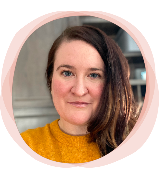 Headshot of Kat Harrison with a pale peach watercolor outline. She is smiling.