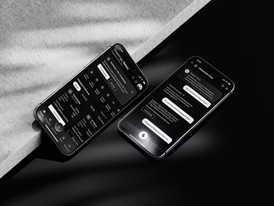 A black and white mockup of two phones laying on ground.