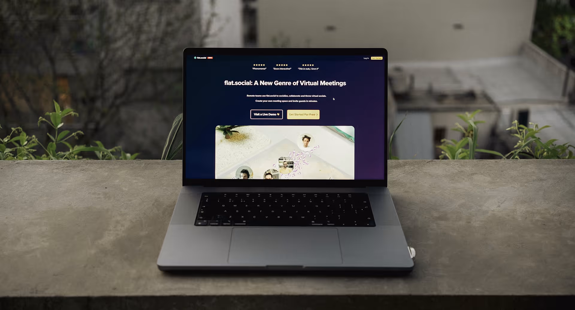 Laptop on a concrete surface displaying flat.social webpage titled 'A New Genre of Virtual Meetings'.