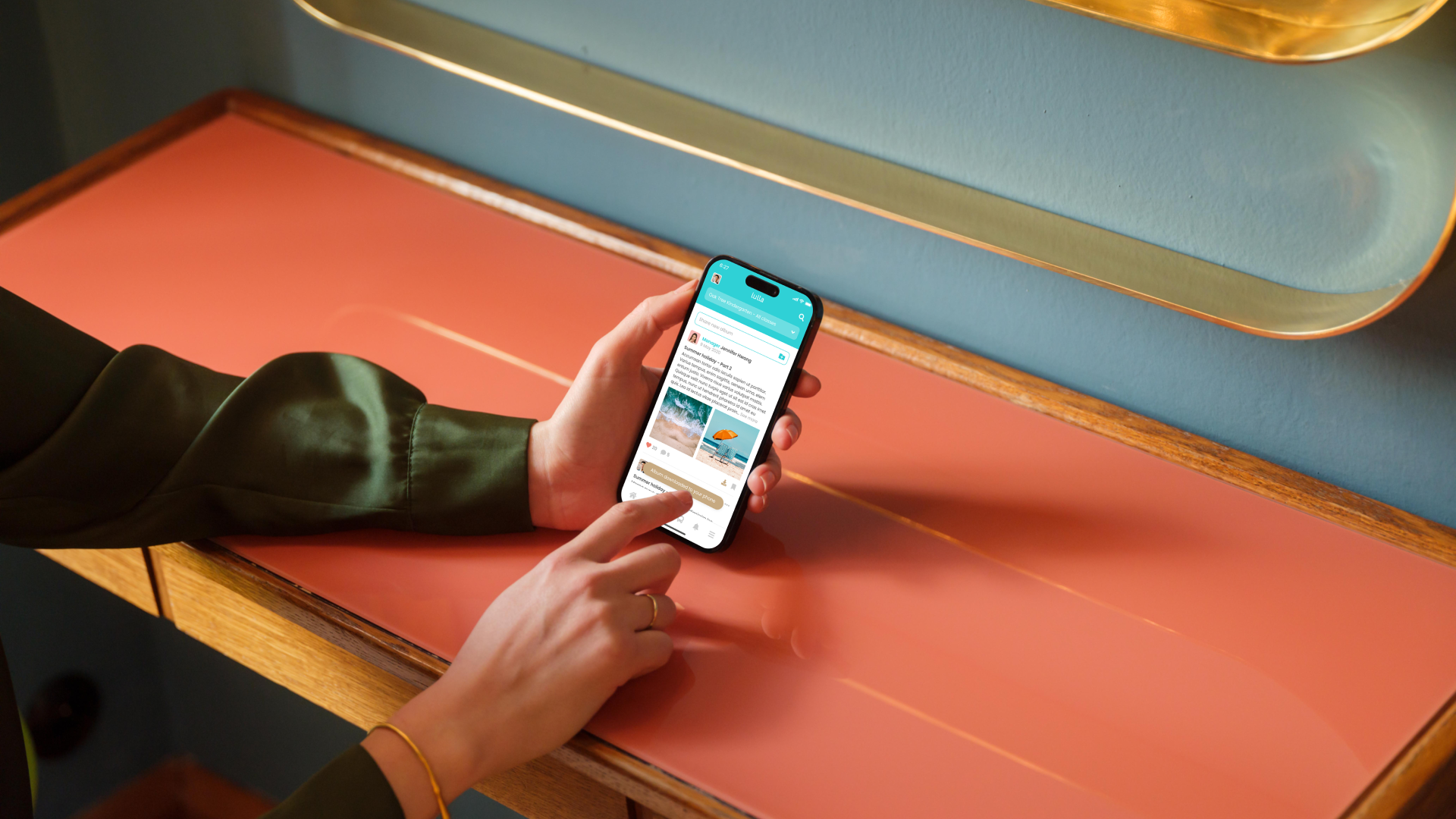 A lady holding a phone 