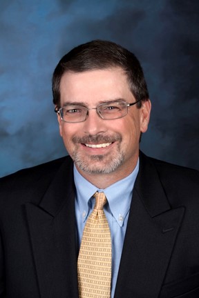 Headshot of Katy Abraham, President, CERT
