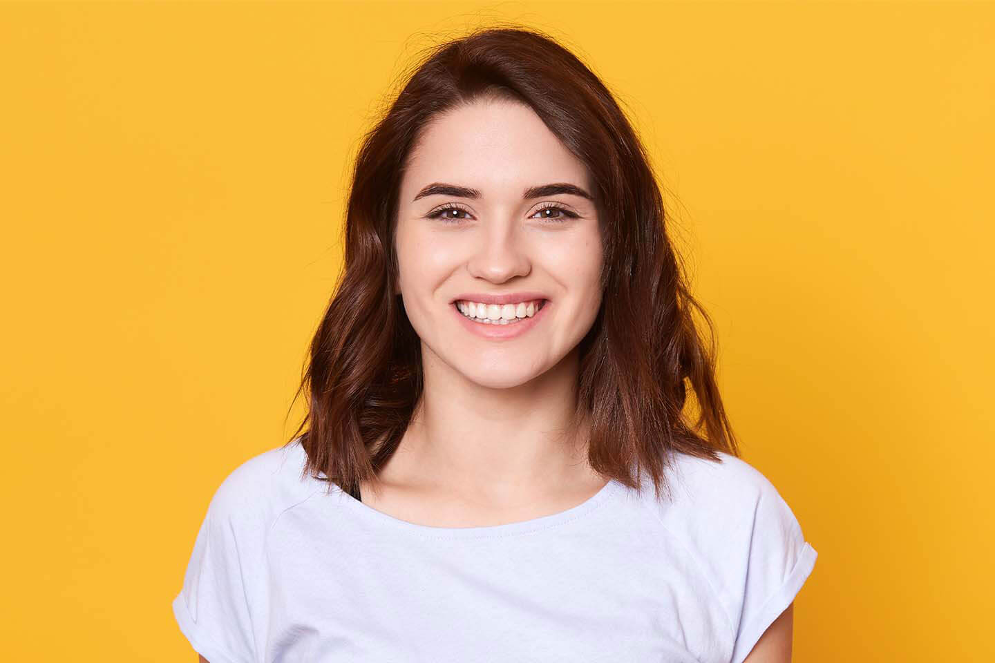 A woman with a smile on her face.