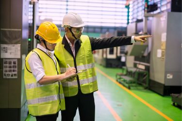 Two people conducting a safety audit