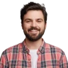 a man with a beard wearing a plaid shirt