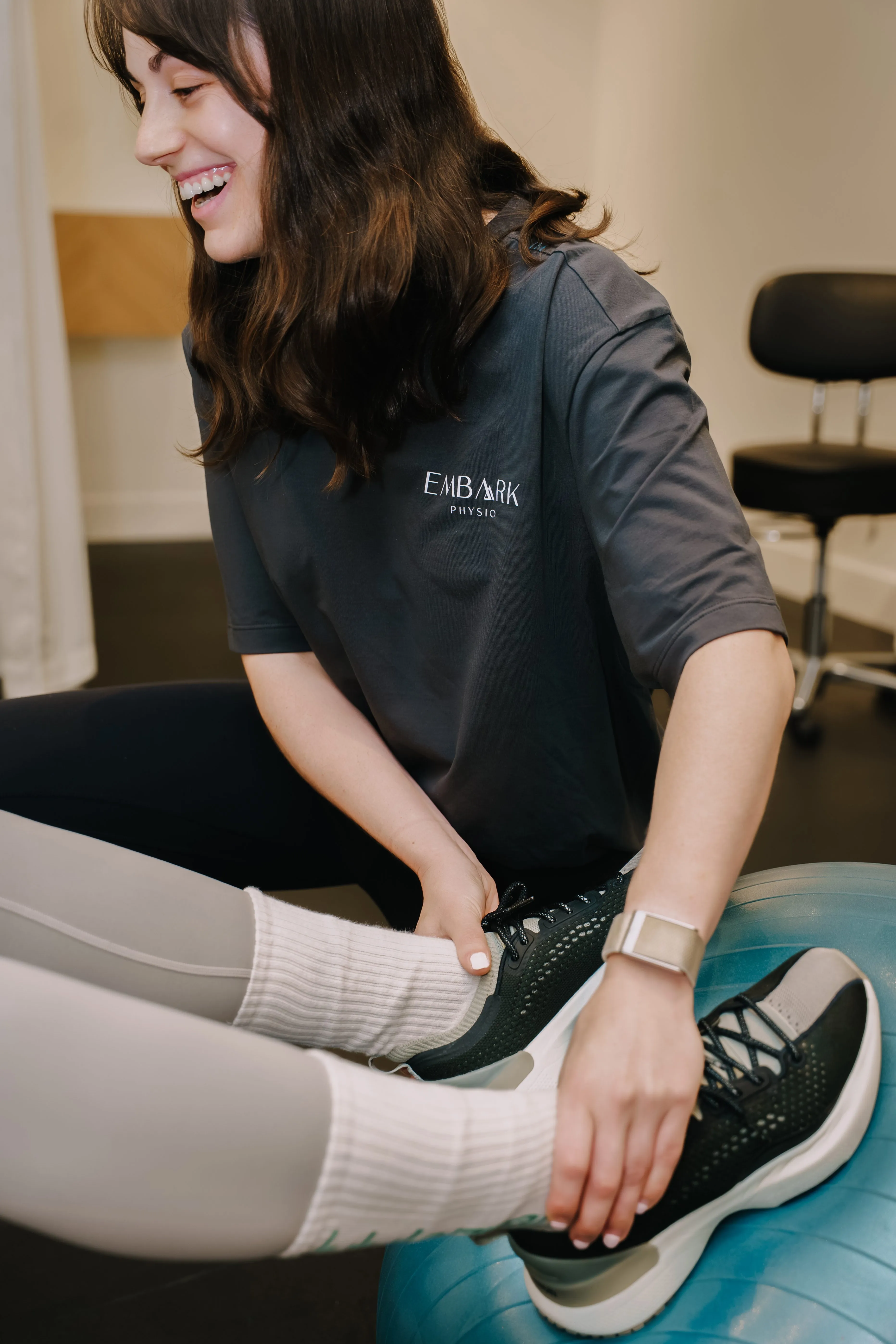 Physio showing an exercise for a patient