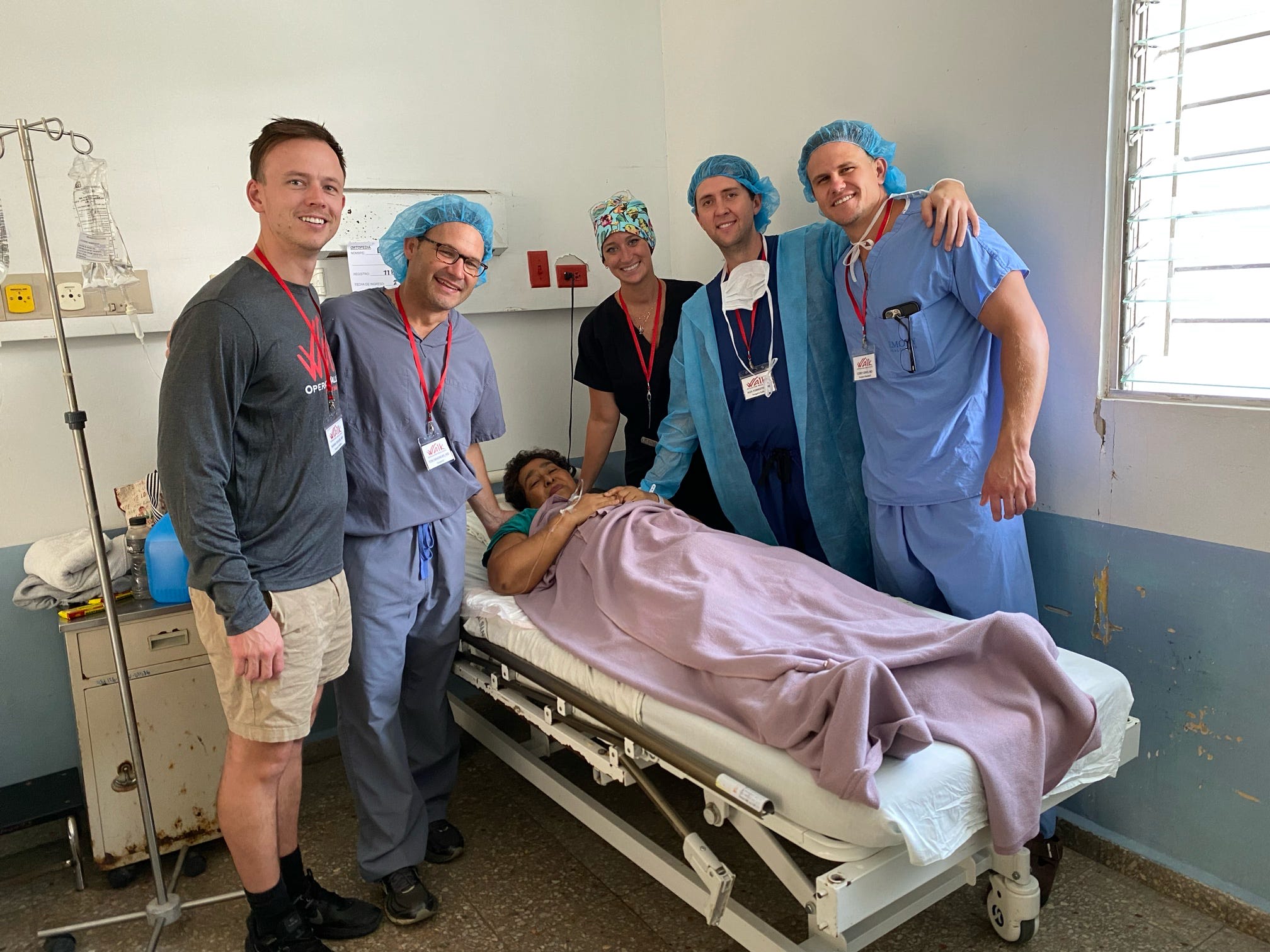 head surgeon smiling with patient