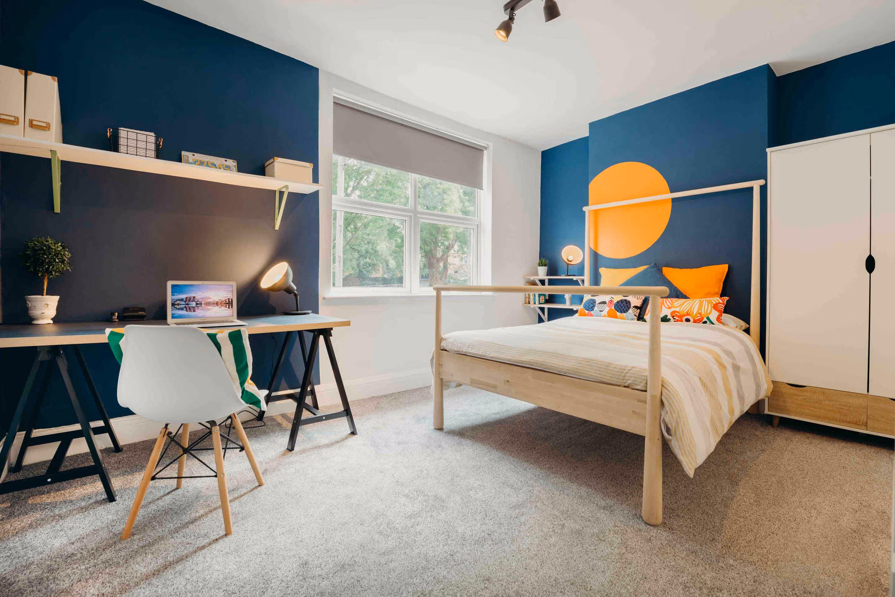 A photograph of a bedroom after decoration has taken place by RS Builders