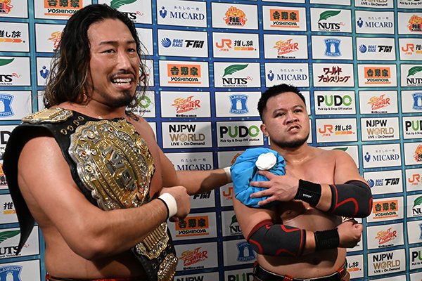 Yota Tsuji and Ares backstage following Ares' NJPW debut at Korakuen Hall